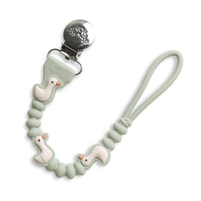 Paci strap featuring cute goose designs with a silver clip and a soft mint green cord for securing pacifiers.