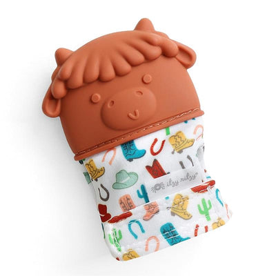 Silicone teething mitten designed as a cow, featuring a colorful fabric with cowboy hats and boots.