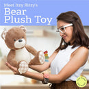 Soft bear plush toy by Itzy Ritzy, held by a woman, features colorful tags and a checkered bottom. Ideal for newborns.