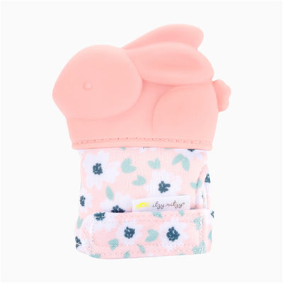Teething mitt in the shape of a pink bunny, featuring a floral fabric and attached tag, designed for babies.