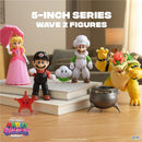 Princess Peach, Mario, Luigi, Bowser, and a star figure on books, showcasing Jakks 5-inch figures Wave 2 assortment.