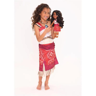 Child dressed in Moana-themed outfit holding a Moana doll, showcasing vibrant colors and intricate patterns.