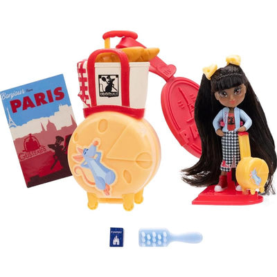 Disney ILY 4ever Tote features a doll with long hair, a stylish outfit, a suitcase, a postcard, and accessories like a passport and a brush.