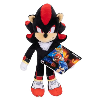 Plush toy of Shadow from Sonic 3, featuring vibrant colors and a tag with graphics of other characters.