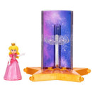 1.5” Princess Peach figure with a pink dress and crown, next to a purple and orange Star Launcher accessory.