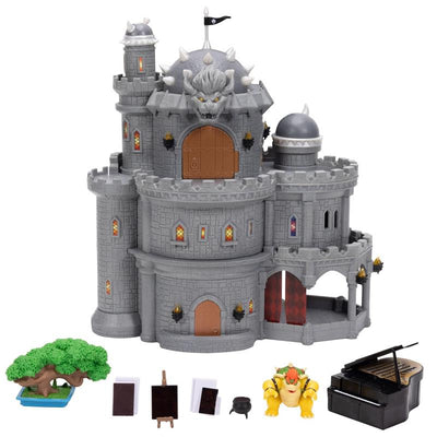 Deluxe Bowser Castle playset from Super Mario Galaxy features a gray castle, Bowser figure, piano, and various accessories.