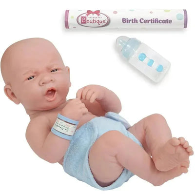 Realistic baby doll with a blue diaper, a birth certificate, and a baby bottle.