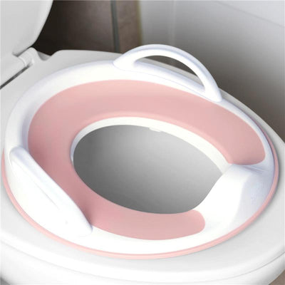Potty training seat for toddlers, pink with white accents, featuring handles for stability, designed for toilet use.