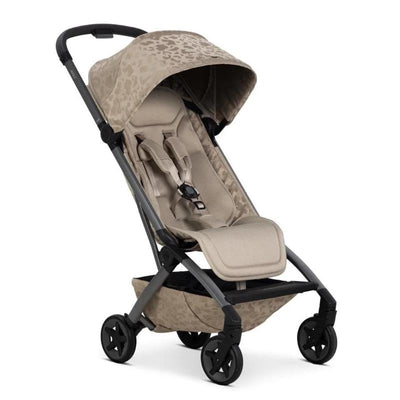 Joolz Aer2 stroller buggy in Chic Renaissance Taupe with a leopard-patterned canopy and black frame.