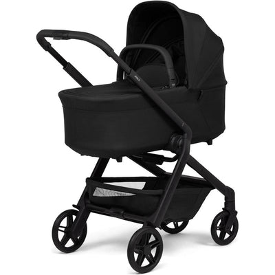 Joolz Hub2 Cot in Space Black, featuring a sleek design with a large canopy, comfortable interior, and smooth-rolling wheels.