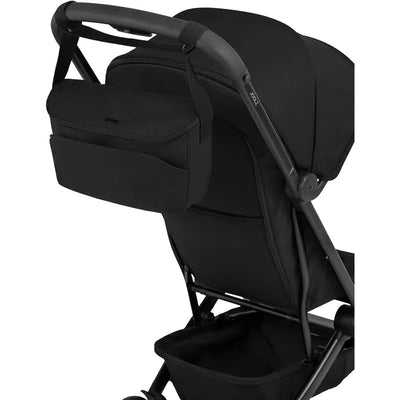 Black Joolz Organiser Space attached to a stroller, providing accessible storage for essentials and maintaining a streamlined look.