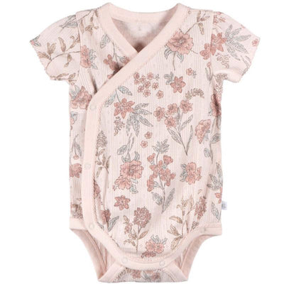 Kimono-style baby bodysuit in pink with floral pattern, featuring short sleeves and snap closures.