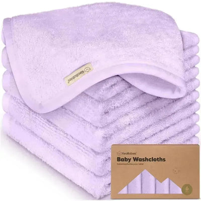 Soft lilac 6-pack baby wash cloths by Keababies, featuring a tag and neatly stacked for display.