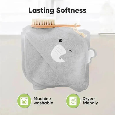 Hooded gray baby towel shaped like an elephant, highlighting features: machine washable and dryer-friendly. Bamboo brush on top.