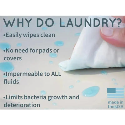 Grey Keekaroo Peanut Changer Silicone Diaper Pad with visible water droplets and cleaning instructions.