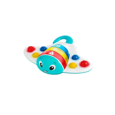 Popper toy featuring a smiling stingray design with colorful rolling beads and buttons in red, yellow, and blue.