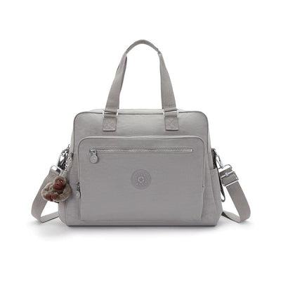 Kipling Alanna Baby Diaper Bag in Cloudy Grey, featuring a zippered front pocket and a plush monkey keychain.