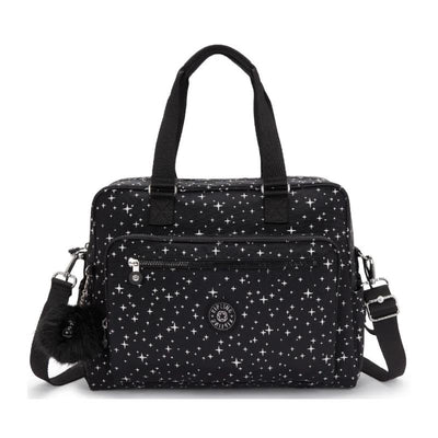 Kipling Alanna Baby Diaper Bag in Cosmic Twilight, featuring a black fabric with white star pattern, top handles, and a detachable shoulder strap.