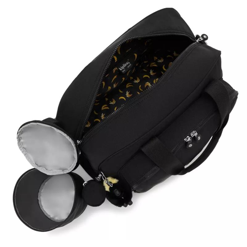 Kipling Camama Diaper Bag in Tiny Black Noir, featuring a zippered opening and a patterned interior. Includes side pockets and a charm.