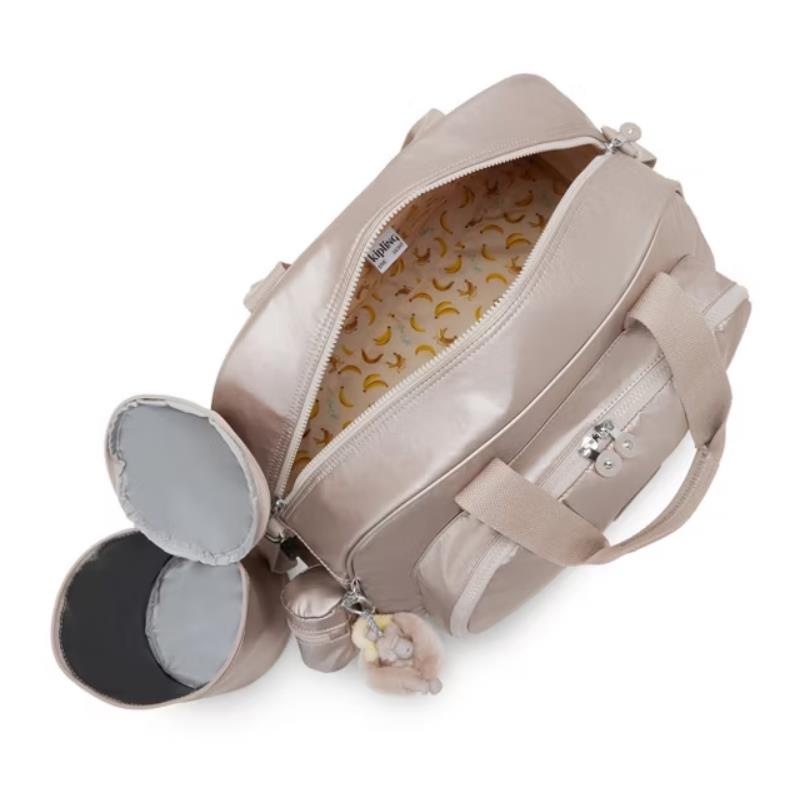 Kipling Camama Diaper Bag in Tiny Metallic Glow with a banana-patterned lining and a charm, featuring a detachable insulated pouch.