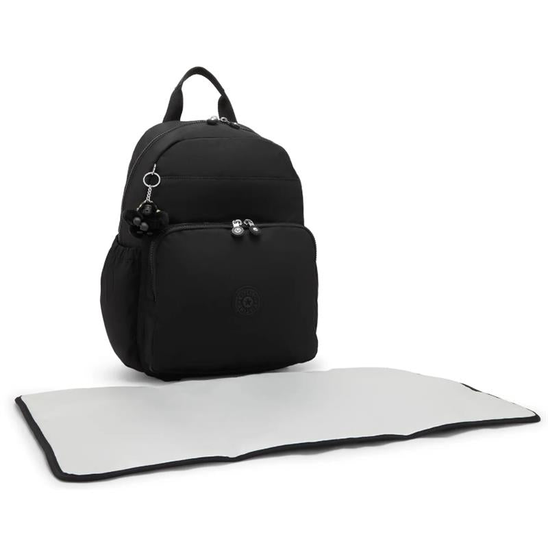Kipling Maisie Diaper Backpack in Tiny Black Noir with a front pocket and changing mat displayed.