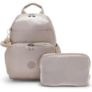 Kipling Maisie Diaper Backpack in Tiny Metallic Glow, featuring a soft pink shade, zippers, and a detachable organizer pouch.