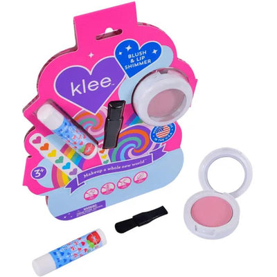 Blush and lip shimmer set featuring Klee Naturals products, including a pink blush and two lip shimmer sticks.