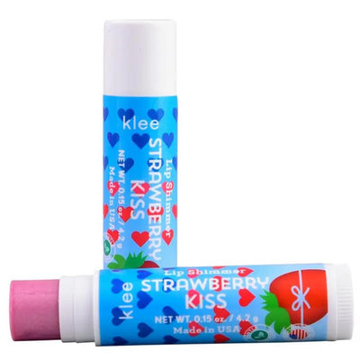 Klee Naturals Strawberry Kiss Lip Shimmer, featuring a light pink color and a playful blue packaging with hearts.
