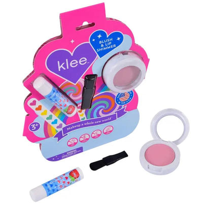 Klee Naturals Sunshine Whisper Blush and Lip Shimmer set featuring two lip shimmer sticks, a blush, and an applicator on a colorful display.