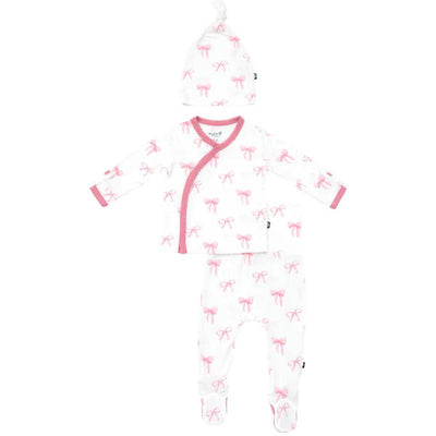 Baby girl take me home set featuring a white top and bottom adorned with pink bow prints and a matching knotted cap.