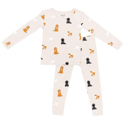 Neutral long sleeve pajamas for babies, featuring a fluffy dog pattern in various colors on a light background.