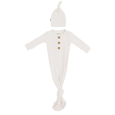 Ribbed oatmeal-colored knotted gown set with a matching hat, featuring three wooden buttons on the front.