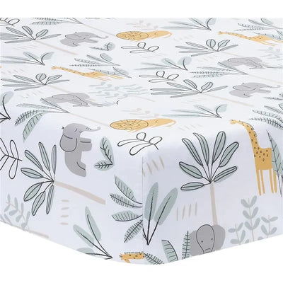 Lambs & Ivy Jungle Adventure Sheet featuring playful animal motifs like elephants and giraffes, set against green foliage.