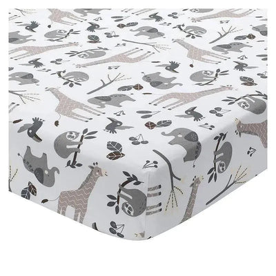 Lambs & Ivy Jungle Baby Crib Fitted Sheet featuring playful animal designs, including giraffes, sloths, and elephants on a white background.