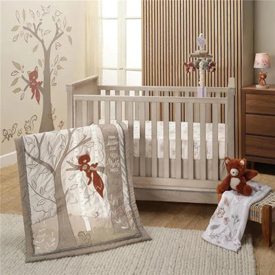 Lambs & Ivy Treetop Fox crib sheet with a cozy fox-themed quilt, plush fox toy, and nature-inspired nursery decor.