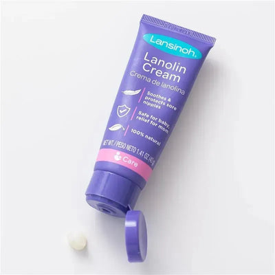 Lansinoh Lanolin Nipple Cream tube with purple packaging, indicating soothing and protecting sore nipples, 100% natural.