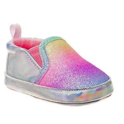 Toddler crib shoe in tie-dye design, featuring a glittery gradient from pink to purple, with a soft pink interior.