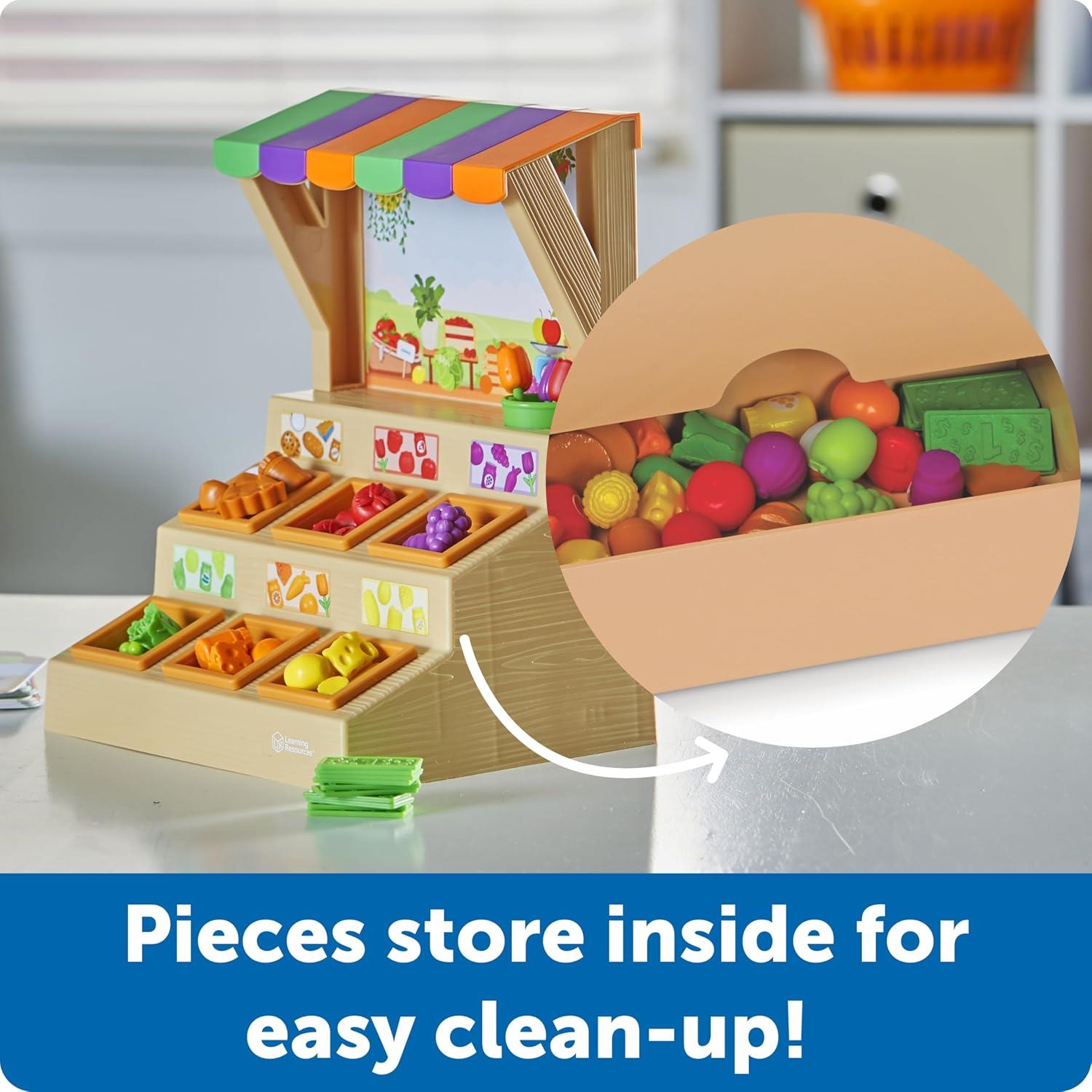 Learning Resources Mini Farmstand Sorting Set featuring colorful food items in bins with a storage compartment for easy clean-up.
