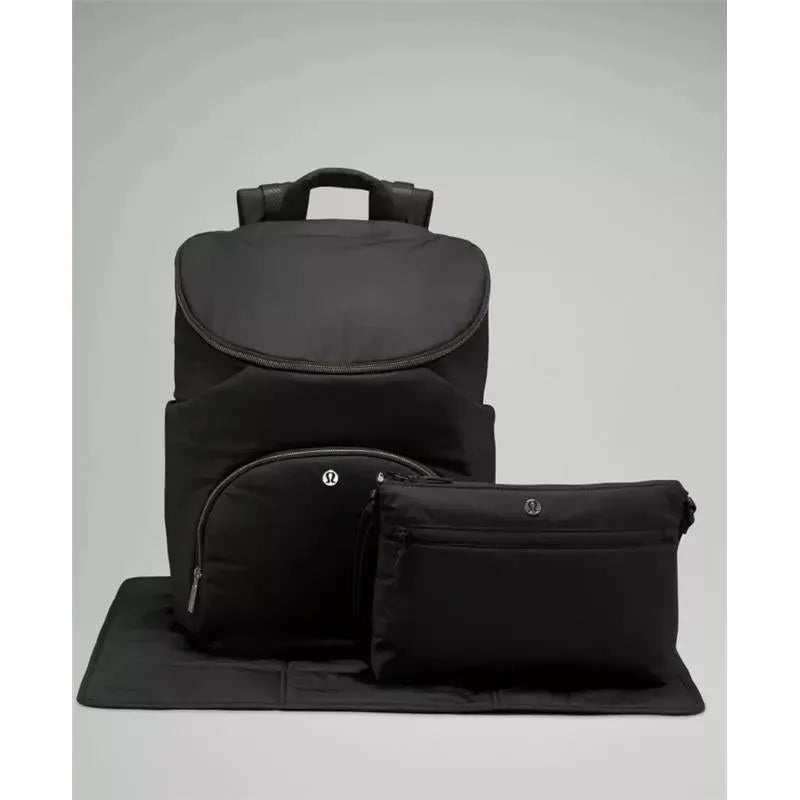 lululemon diaper bag black Backpack ReNew Family Consignment Plus A Removable Pouch With A Changing Mat For Convenience While Away From Home Lululemon - New Parent Backpack