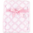 Coral fleece baby blanket in a pink lattice pattern, tied with a pink ribbon.