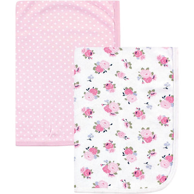 Interlock cotton swaddle blankets featuring a pink polka dot design and a floral pattern with pink roses.