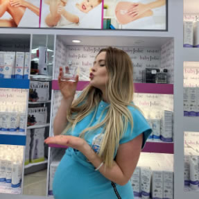 Influencer Showing the Best Baby Perfume on the Market
