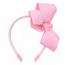 MacroBaby pink baby headband with a large grosgrain ribbon bow