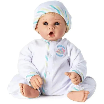 Madame Alexander Little Sweetheart doll with light skin tone, blue eyes, and blonde hair, dressed in a white onesie and hat.