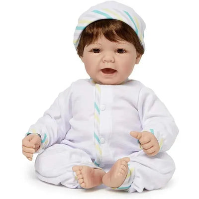 Madame Alexander 19-inch doll with light skin tone, brown eyes, and brown hair, dressed in a white outfit and hat.