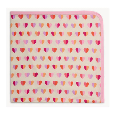 Pink Xoxo modal baby blanket featuring a pattern of various hearts in pink, orange, and purple, with a pink border.