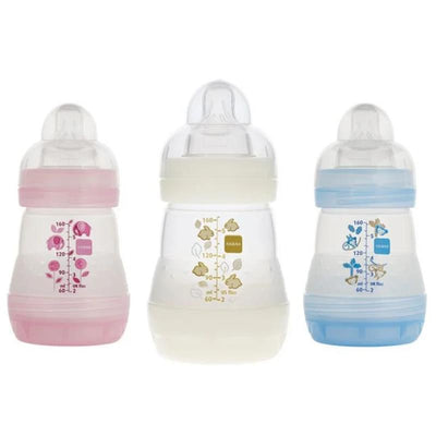 Three Mam 5oz baby bottles in assorted colors: pink, white, and blue, each with measurement markings and cute designs.