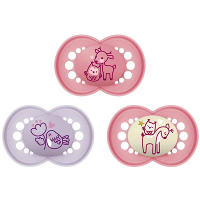 Three pacifiers for girls, featuring playful animal designs: a deer and owl, a bird with a flower, and a unicorn.