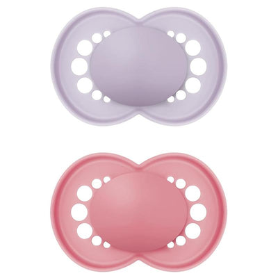 Two pacifiers for girls: one purple and one pink, both designed for infants aged 16 months and older.