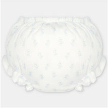 Baby girl bloomer in woven fabric featuring a white base with light blue floral prints and ruffled edges.